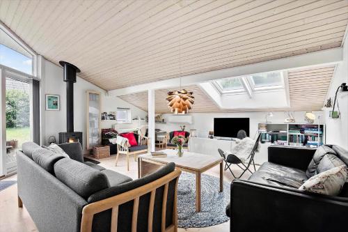 a living room with couches and a dining room at K19045-Kalundborg-Lobelievej-3 in Kalundborg