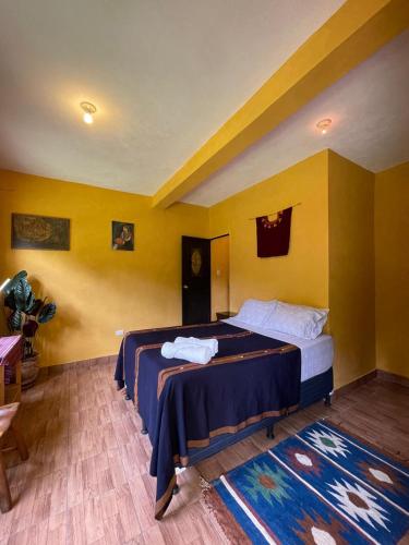 Postel nebo postele na pokoji v ubytování Casita del Sol