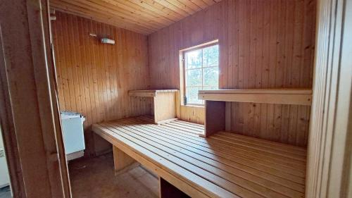 a room with a wooden cabin with a window at Messlingen, Orrstigen 16 in Funäsdalen