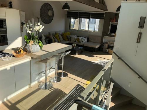 an aerial view of a kitchen and living room at Villa Le Rubis in Agon Coutainville