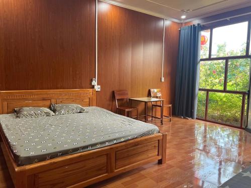 Ένα ή περισσότερα κρεβάτια σε δωμάτιο στο Hà Giang Eco Bungalow