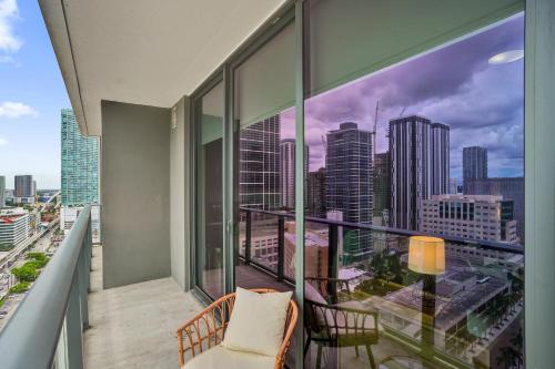 a balcony with a view of a city skyline at Cadenza Miami - Luxury Residences in Miami