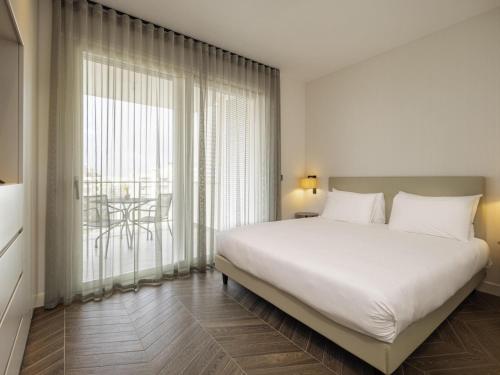 Katil atau katil-katil dalam bilik di Mercure Villa Romanazzi Carducci Bari