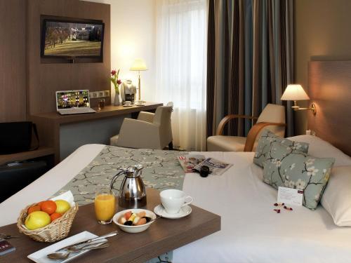 Una cama o camas en una habitación de Mercure Hotel Forbach Centre de Loisirs