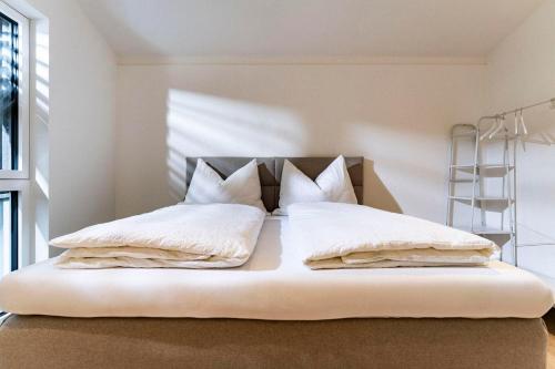 Una cama o camas en una habitación de 21trees