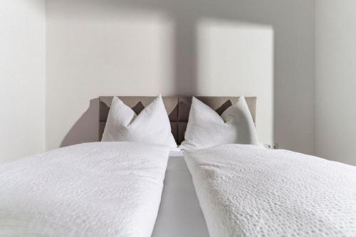 Una cama o camas en una habitación de 21trees