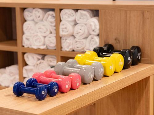 a wooden shelf with a toy train on it at Novotel Paris Vaugirard Montparnasse in Paris