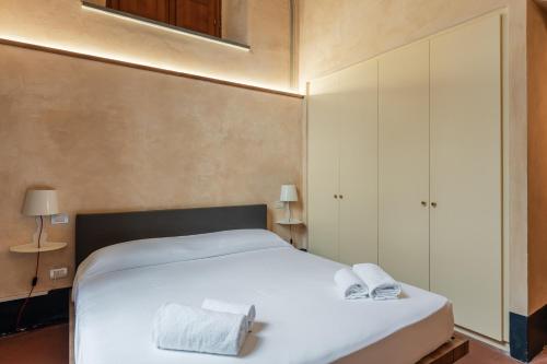 Una cama o camas en una habitación de Il Nido di Robin