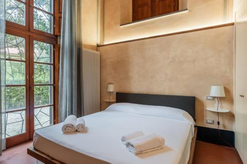 Una cama o camas en una habitación de Il Nido di Robin