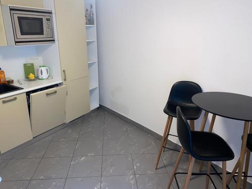 Kuchyň nebo kuchyňský kout v ubytování Florian