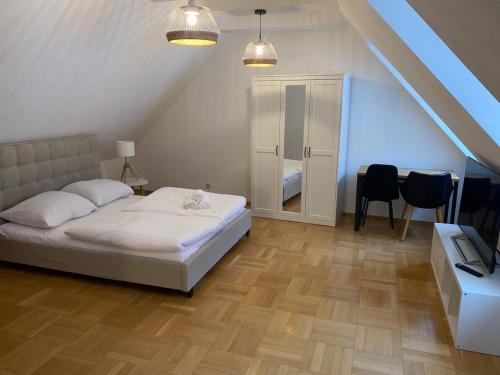 Postel nebo postele na pokoji v ubytování Florian