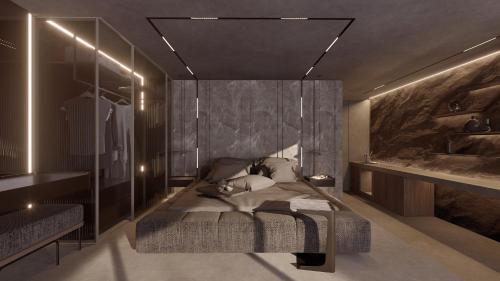 a bedroom with a bed and a wall at NEMA Design Hotel & Spa - Adults Only in Hersonissos