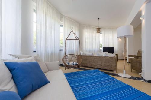 Televiisor ja/või meelelahutuskeskus majutusasutuses Cinque Terre Moneglia Apartments