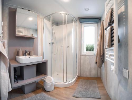 Ένα μπάνιο στο Tiny House mit Terrasse und Garten in Altstadtnähe inkl Parkplatz