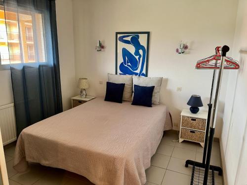 Katil atau katil-katil dalam bilik di Appartement Miramar