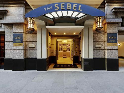a building with a sign that reads the seelel at The Sebel Melbourne Flinders Lane in Melbourne