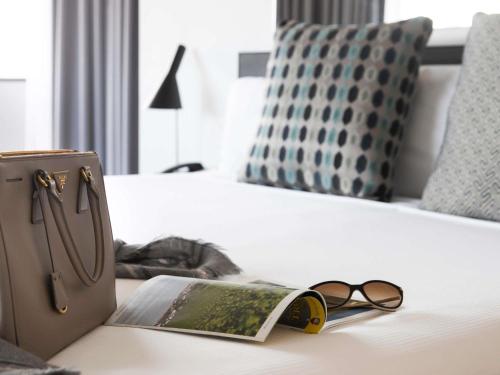 Voodi või voodid majutusasutuse Mercure Sydney toas