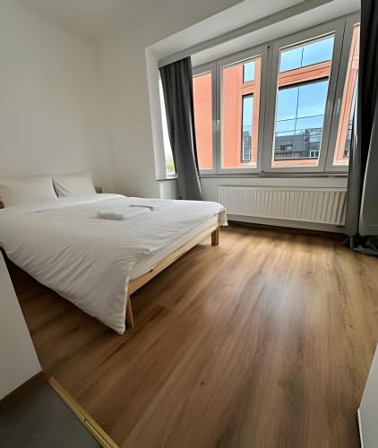 Postel nebo postele na pokoji v ubytování Ideal Room Near Gare du Midi