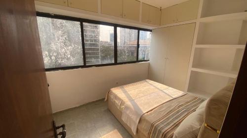 Postel nebo postele na pokoji v ubytování T1 - Mutamba -cidade , Luanda, Angola