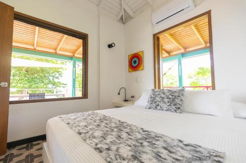 Letto o letti in una camera di Seaflower Boutique lodge