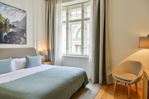 Postel nebo postele na pokoji v ubytování BoHo Prague Hotel - Small Luxury Hotels