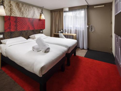 Postel nebo postele na pokoji v ubytování ibis Coventry South