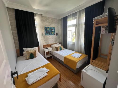 Postel nebo postele na pokoji v ubytování Hotel Zürich