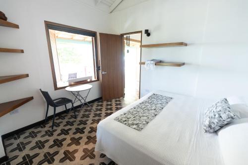 Letto o letti in una camera di Seaflower Boutique lodge