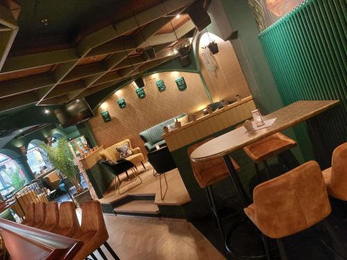 an overhead view of a bar in a restaurant at Mercure Hotel Riesa Dresden Elbland in Riesa