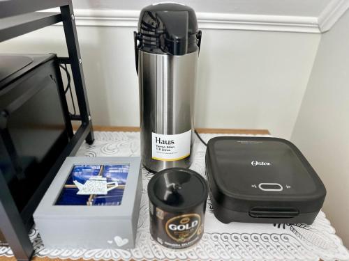 a blender sitting on a counter next to a box at Latitud Guesthouse in Puerto Montt