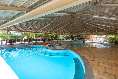 Πισίνα στο ή κοντά στο diRoma Thermas direto com o Grupo diRoma com acesso ao Acqua Park e Café da manhã