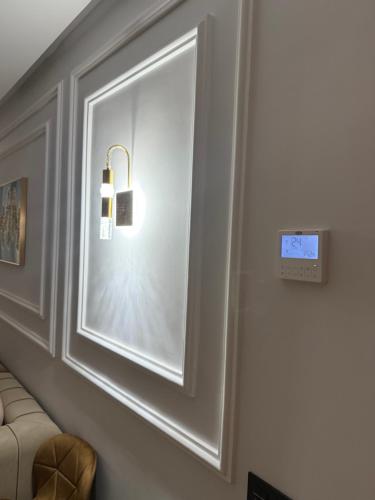 TV a/nebo společenská místnost v ubytování Appartement de luxe Agadir Bay près plage