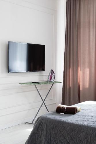 TV a/nebo společenská místnost v ubytování Апартаменты на главной улице Сыганак, рядом с Ханшатыр