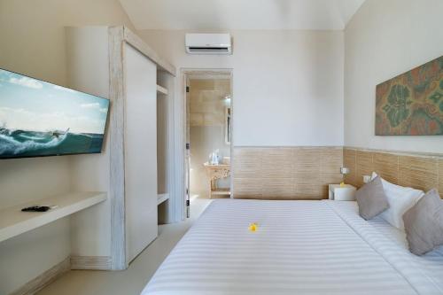 Katil atau katil-katil dalam bilik di Villa Nakula Suites