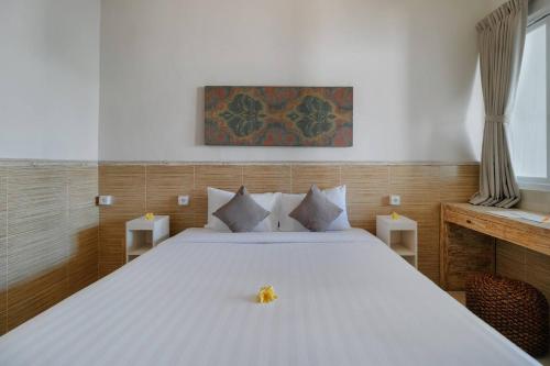 Katil atau katil-katil dalam bilik di Villa Nakula Suites