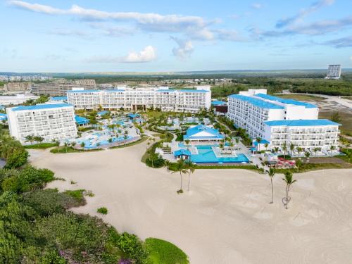 an aerial view of a resort with a beach at Dreams Cap Cana Resort & Spa - All Inclusive in Punta Cana