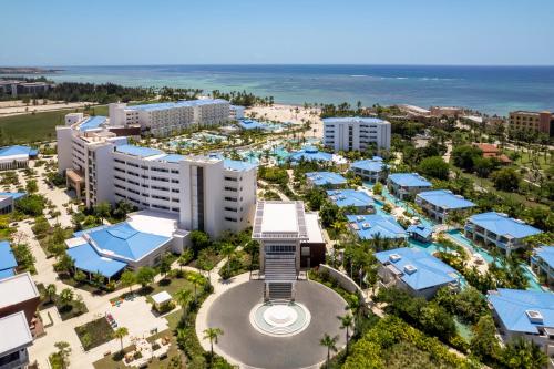 an aerial view of a resort with the ocean at Dreams Cap Cana Resort & Spa - All Inclusive in Punta Cana