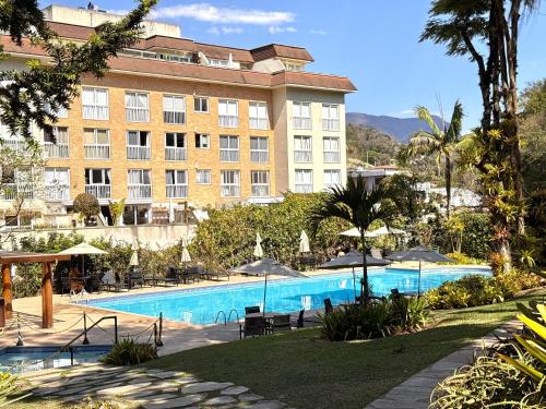 Bazén v ubytování Estúdio Moderno na Granja Brasil – Itaipava nebo v jeho okolí