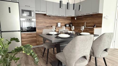 Kuchyň nebo kuchyňský kout v ubytování Z Apartman