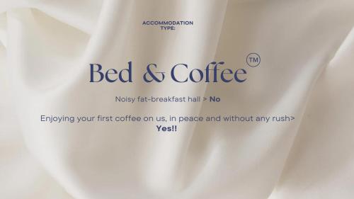 a white cup of coffee with a label on it at Suite With Wellness Nextdoor And Kitchen Access in Oss