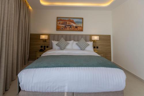 Katil atau katil-katil dalam bilik di Petra Legacy Luxury