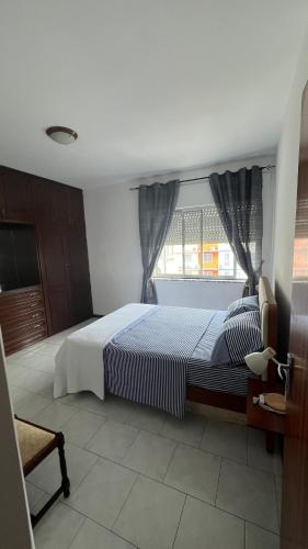 Llit o llits en una habitació de Casa Fortes