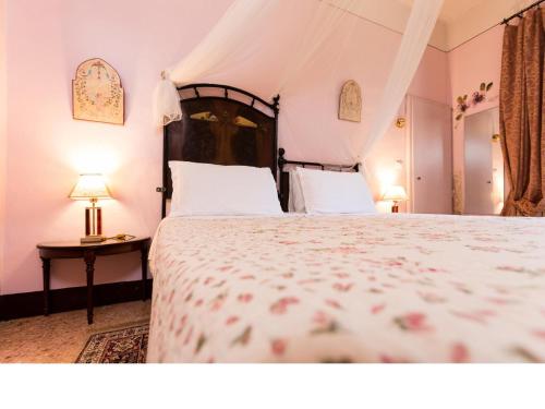 Posteľ alebo postele v izbe v ubytovaní Casa Fiorita