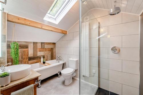 a bathroom with a sink toilet and a shower at 1 Bed in Askrigg oc-c33109 in Askrigg