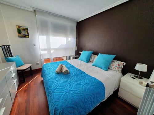 Ένα ή περισσότερα κρεβάτια σε δωμάτιο στο Beachfront Apartment