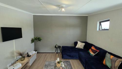 Una televisión o centro de entretenimiento en Loft Moderne