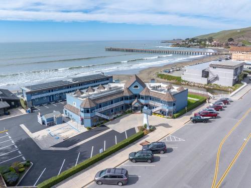 an aerial view of a city with a beach at Shoreline Inn...on the beach in Cayucos