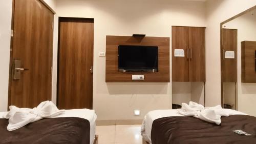Una cama o camas en una habitación de Hotel Amber Edition