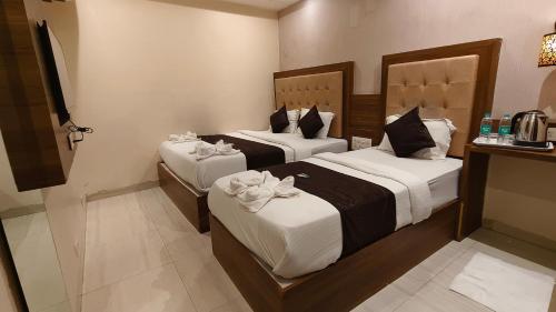 Una cama o camas en una habitación de Hotel Amber Edition