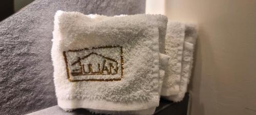 a white towel with the word jordan on it at CASA DON JULIAN in Oaxaca City